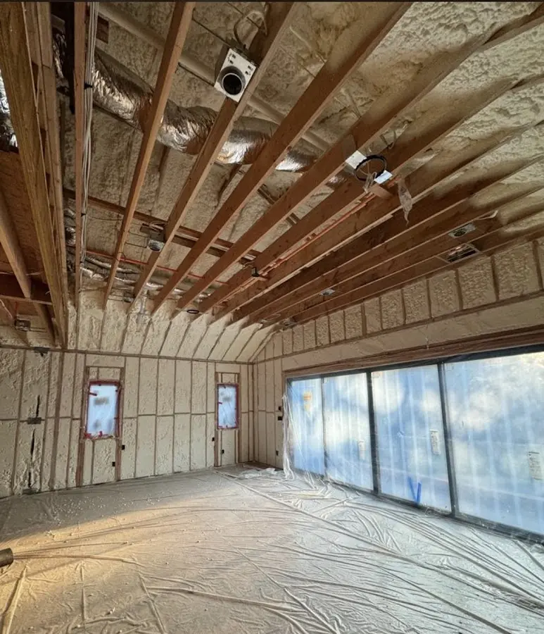 Interior walls and ceiling insulated with spray foam during new construction in Sartell