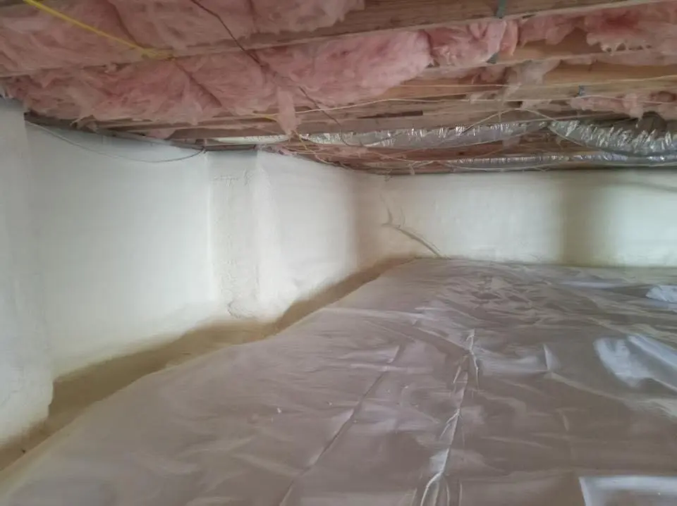 Crawl space encapsulation with closed-cell spray foam for Commercial Roof Restoration in Sartell